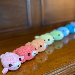 Rainbow Baby Seals: crocheted, handmade, lavender scented amigurumi toy and keyrings