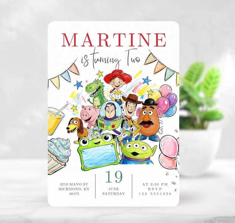 May include: A rectangular birthday invitation card featuring a colorful illustration of cartoon characters, balloons, and a cupcake. The text reads MARTINE is turning Two, 19 June Saturday, 3219 Mayo St Richmond, KY 40475, and At 3:30 PM RSVP 123 5551230.