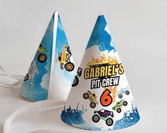 May include: Two blue and white party hats with a monster truck theme. The hats have a watercolor background with monster trucks, flames, and the text "Gabriel's Pit Crew" and "6".