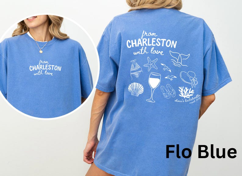 May include: A periwinkle blue t-shirt featuring white screen-printed graphics. The front displays the text "from CHARLESTON with love". The back features the same text above illustrations of a bikini, starfish, whale tail, wine glass, seagulls, sandals, sun hat, and coral, with "olivia's bachelorette" text.