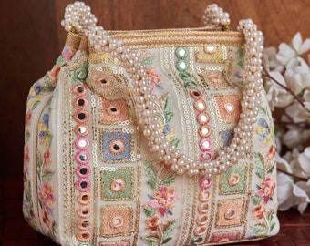 Traditional Embroidered Potli handbag, bag with Pearl handle and Designer Pattern for Wedding, Evening Party, Ethnic wear and gifting.