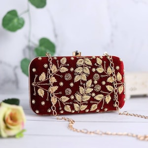 Velvet Maroon Red Embroidered Clutch purse, bag with Designer Pattern, shoulder strap and handle for Wedding, Evening Party and Ethnic wear.