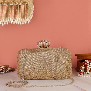 Elegant Gold Clutch purse, bag with Royal Embroidery, Luxury texture, shoulder strap and sling for Wedding, Day Party and Ethnic wear.