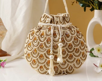 White velvet Potli bag, handbag with Embroidered Tassels, Yellow Gemstone and Chic Pattern for White themed Wedding and Evening Party.