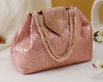 Aesthetic Metallic handbag, bag with Quality Fabric & Dazzling Rose gold look for Wedding, Evening Party, Ethnic wear and gifting.