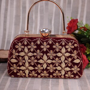 Golden hand cheap purse