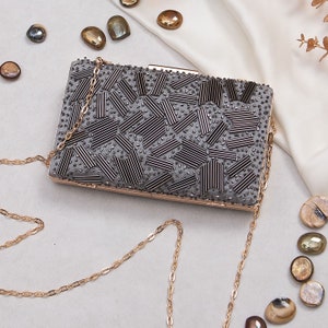 Nardo grey Sequin clutch with Designer Pattern, shoulder strap, handle and metal frame for Wedding, Evening Party and gifting.