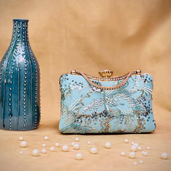 Water Blue clutch with Embroidery work , Zari Art Pattern and easy to handle for Winter Weddings, Evening Party and Bridesmaid gifting.