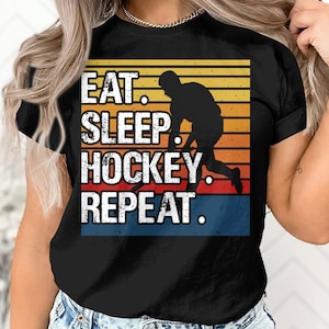 Hockey Lover T-Shirt, Eat Sleep Hockey Repeat Tee, Casual Ice Hockey Fan Shirt, Vintage Style Sports Apparel, Gift for Hockey Enthusiasts