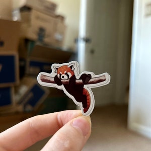 Glanzende sticker hangende rode panda voor laptop, telefoon, iPad-hoesje, toetsenbord, boeken