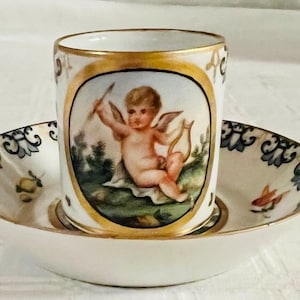 Exceptional Antique Donath Dresden Porcelain Demitasse Cup & Saucer Handpainted Angel Cherub