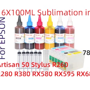 May include: Six 100 ml bottles of sublimation ink for Epson Artisan 50 Stylus R260, R280, R380, RX580, RX595, and RX680 printers. The ink bottles are labeled with the colors black, cyan, magenta, yellow, and light cyan. The ink bottles are arranged in a row on a white surface. There are also six clear syringes with needles.