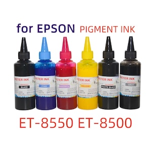 May include: Six bottles of pigment ink for Epson printers. The bottles are black, cyan, magenta, yellow, photo black, and gray. The text on the bottles reads "PETER INK" and "for EPSON PIGMENT INK". The product is for ET-8550 and ET-8500 printers.