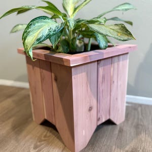 Cedar planter box for potted plants, indoor/outdoor.