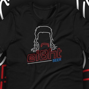 May include: Black t-shirt with a white outline of a man with long hair and a mustache. The text "eight BEER" is in red and blue neon.