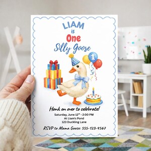 May include: A birthday invitation with a whimsical design. The invitation features a cartoon goose wearing a party hat and bow tie, with balloons and a cake. Text includes "Liam is One" and party details.