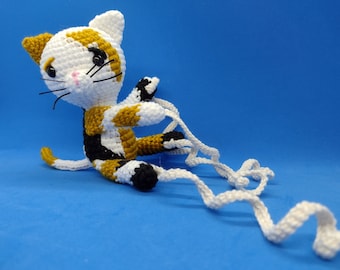 Amigurumi calico kitty door stopper