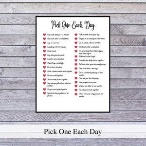 May include: A printable list of 20 romantic activities for couples to do together each day. The list is titled "Pick One Each Day" and features a red heart icon next to each activity.