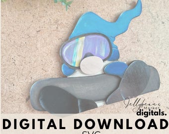 May include: A blue and white gnome wearing a ski mask and holding a snowboard. The gnome is on a wooden background. Digital Download SVG.