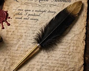 May include: A black and gold quill pen rests on aged parchment paper featuring the text Quoth the Raven - Nevermore and once upon a midnight dreary, while I pondered, weak and weary. A brass inkwell, a red wax seal, and a lit candle are present.