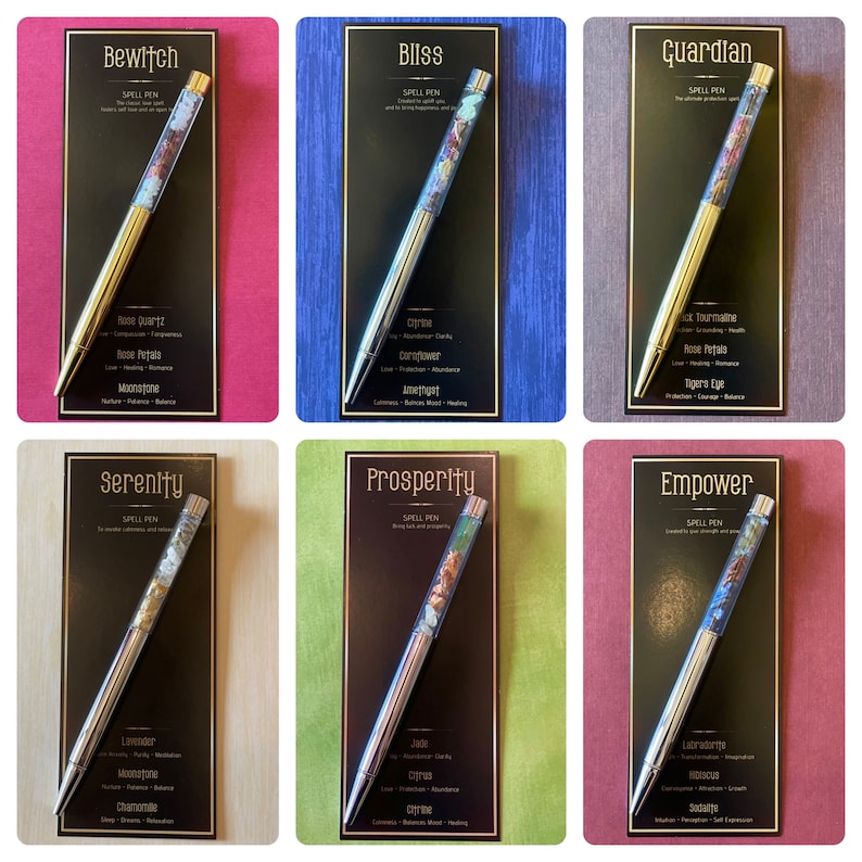 May include: Six metal pens with clear barrels filled with various crystals and dried botanicals, each mounted on a black card labelled with names like Bewitch, Bliss, Guardian, Serenity, Prosperity, and Empower, detailing the specific contents inside.