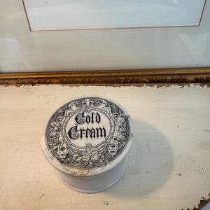 May include: A set of three ceramic mugs with a speckled, matte finish in cream, light brown, and dark brown. The mugs have a simple, minimalist design, ideal for tea or coffee.