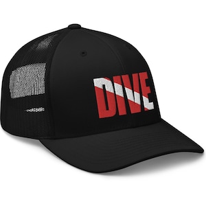 May include: Black trucker hat with a mesh back and a curved brim. The word "DIVE" is embroidered in red and white on the front, with a scuba diving flag design.
