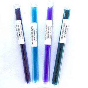 May include: Four glass tubes filled with transparent, colored glass rods. The colors are midnight blue, turquoise blue, deep royal blue, and aquamarine blue. Each tube has a white label with the color name and product information.