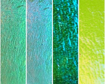 May include: A collage of four vertical panels with abstract textures. The panels display a gradient of colors, including shades of green, blue, and yellow. The textures vary, with some appearing smooth and others more rough and detailed.