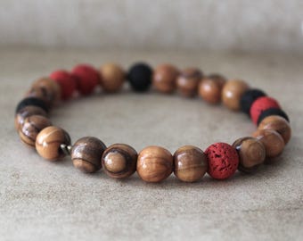 Handcrafted Hebrew Jewelry from Israel, Volcanic Lava Bracelet, Unisex Bracelet With Olive Wood Beads