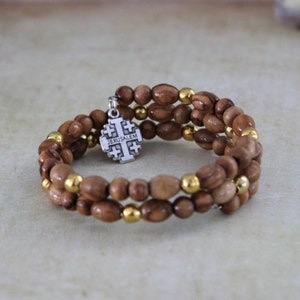 Get Two Beautiful Olive Wood Beads Bracelet With Silver Color Smaller Golden Beads and Jerusalem Cross Icon, Made in the Holy Land Jerusalem