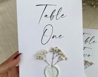 Gypsophila table number with white wax seal
