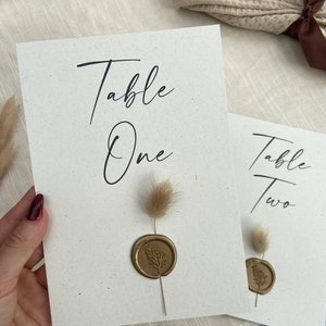 Bunny tails table number with gold wax seal