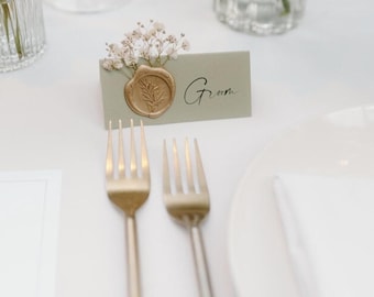 Sage Green and Gold Gypsophila wedding name place cards with wax seal