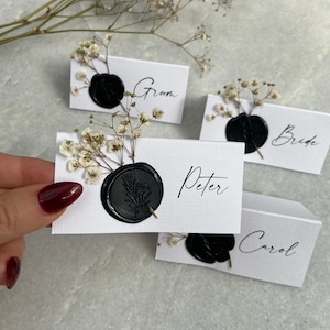 Mono black and white Gypsophila wedding name place cards