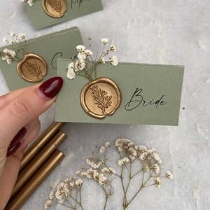 Sage Green and Gold Gypsophila wedding name place cards with wax seal