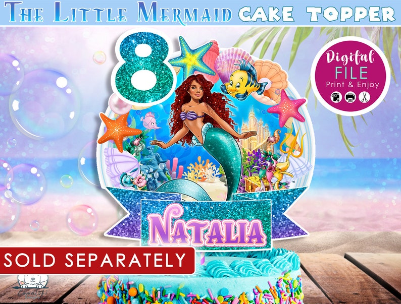 May include: A cake topper featuring a mermaid with red hair and a teal tail, surrounded by sea creatures and the number 8. The name "Natalia" is displayed on a banner. The text "The Little Mermaid Cake Topper" is at the top.