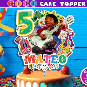 May include: A colourful cake topper featuring a character from the film Coco playing a guitar. The topper includes a number 5, the name Mateo, and a dog. The topper is ideal for a birthday party.