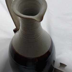 Pottery jug with stopper