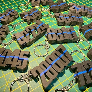 Thin Blue Line keychain - any name or force/collar number.