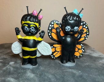 Butterfly and Bee Kewpie Doll