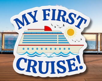 May include: White sticker with blue text that reads "My First Cruise!" and a cartoon image of a white cruise ship with red accents and a blue ocean. The sun is shining and there are birds flying in the sky.