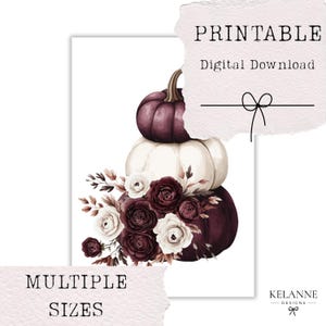 May include: A digital print showing a stack of pumpkins in shades of purple and cream, decorated with burgundy and cream roses and foliage. The words "PRINTABLE Digital Download" and "MULTIPLE SIZES" are displayed on the print.