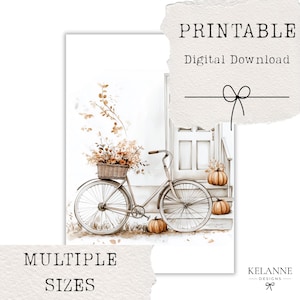 May include: Watercolor print featuring a vintage bicycle with a basket of flowers, parked near a white door and pumpkins. The words "PRINTABLE Digital Download" and "MULTIPLE SIZES" are displayed.