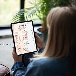 May include: A woman is looking at a tablet screen displaying a price list for a beauty clinic called "Alexa Clinic". The price list includes services such as Botox, Dermal Filler, and Facial Threads.