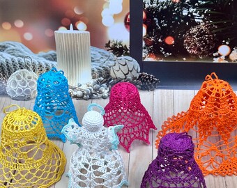 May include: Seven crocheted bell ornaments in various colors, including yellow, blue, white, pink, purple, and orange. The ornaments are arranged on a wooden surface.