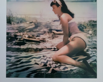 Bettie Page full length pose on beach in leopard skin Tarzan style bikini 