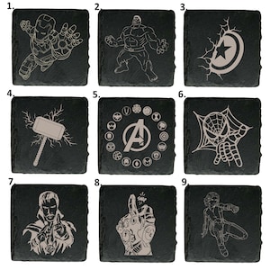 May include: Nine black square coasters with white engraved images of Marvel characters, including Iron Man, Hulk, Captain America, Thor, Spider-Man, Doctor Strange, Thanos, and Black Widow.