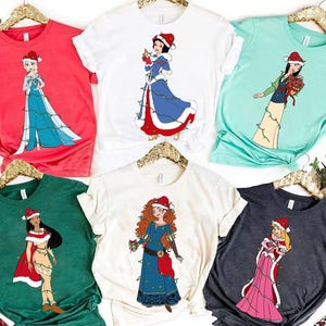 Koszulka z Disney Princess Christmas Lights, koszulka z Elsą Moaną i Jasminą z Meridą, koszulka świąteczna z Disney Princess, prezenty na urodziny księżniczki zdjęcie 2