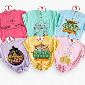 May include: Six colorful t-shirts with various designs and text. The shirts are in shades of pink, teal, light blue, lavender, and yellow. Each shirt features a different graphic and text related to a virtual challenge.